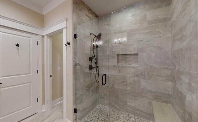 bathroom featuring an enclosed shower