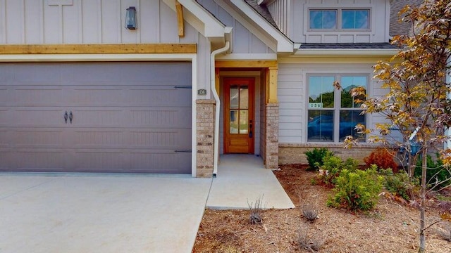 entrance to property featuring a garage