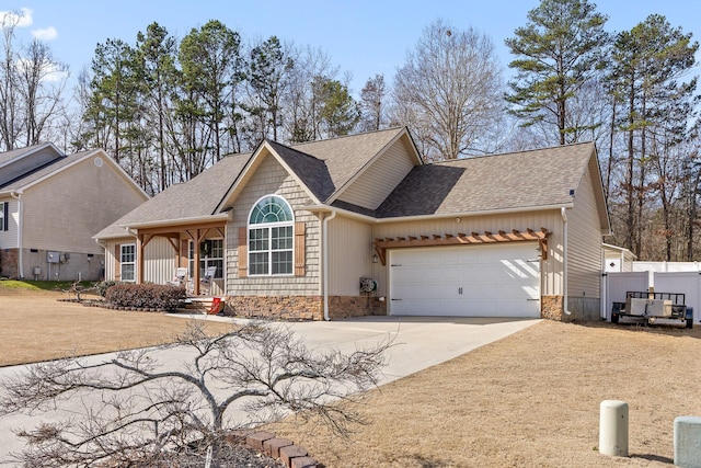 view of front of house with a garage and a porch