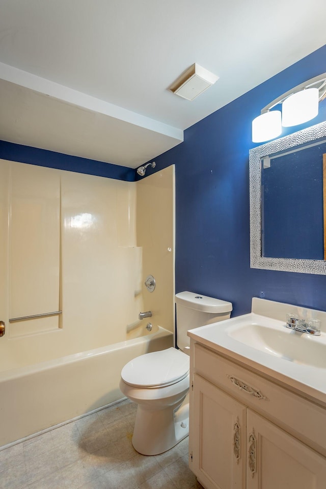 full bath featuring shower / bathtub combination, toilet, and vanity