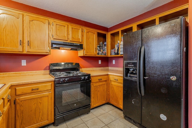 kitchen with brown cabinetry, under cabinet range hood, light countertops, black appliances, and open shelves