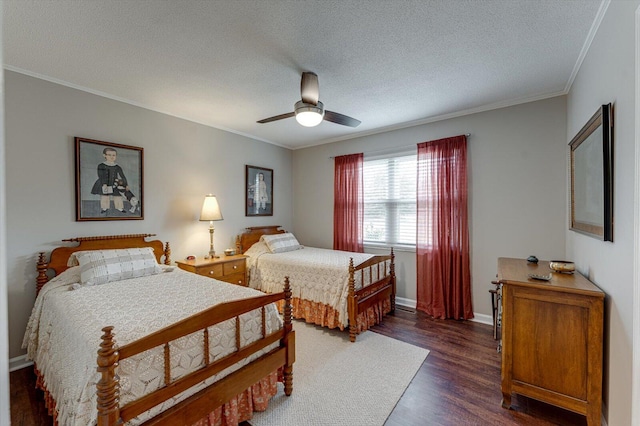 bedroom with ceiling fan, ornamental molding, dark hardwood / wood-style floors, and a textured ceiling