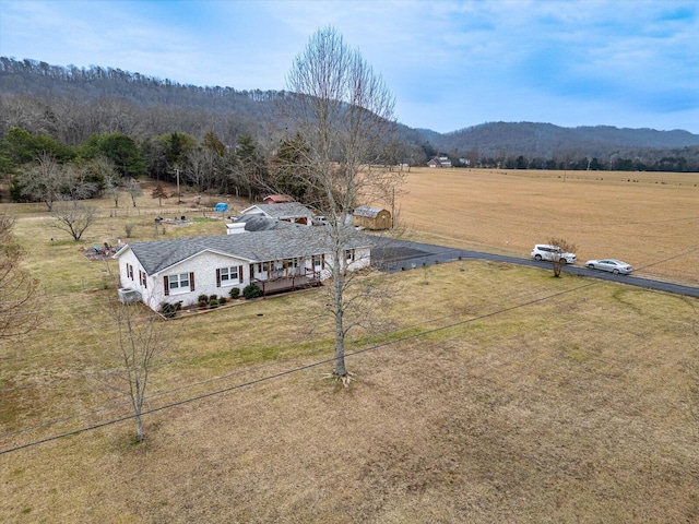 aerial view featuring a mountain view and a rural view