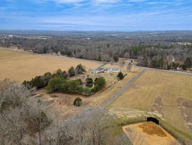 birds eye view of property featuring a rural view