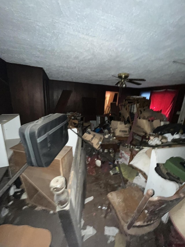 miscellaneous room with a textured ceiling