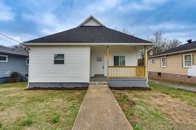 bungalow-style home with a porch and a front yard