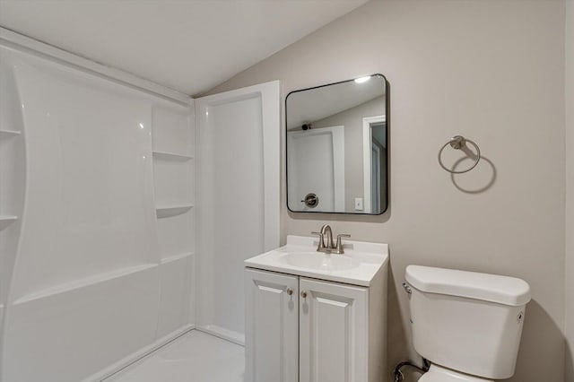 bathroom featuring walk in shower, vanity, toilet, and vaulted ceiling