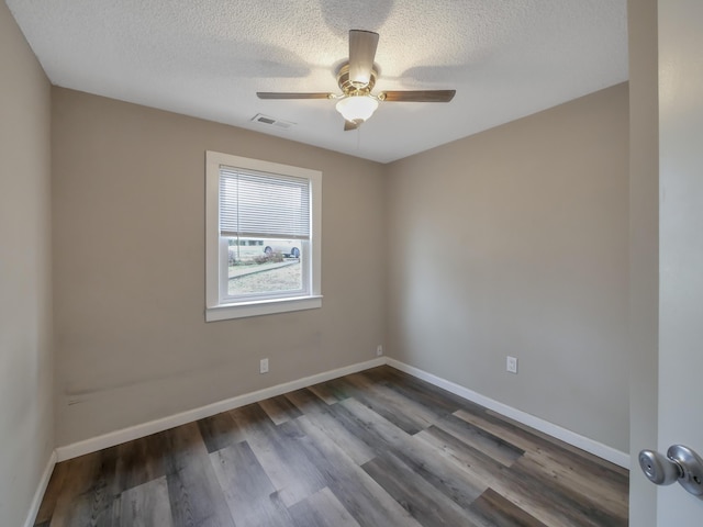 unfurnished room featuring ceiling fan, hardwood / wood-style floors, and a textured ceiling