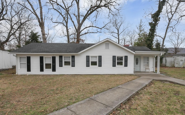 single story home with a front lawn