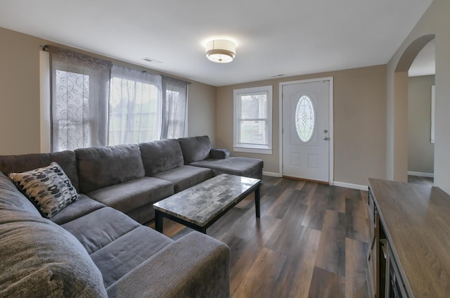 living room featuring dark hardwood / wood-style flooring