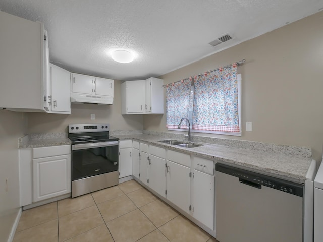 kitchen featuring white cabinetry, stainless steel appliances, and sink