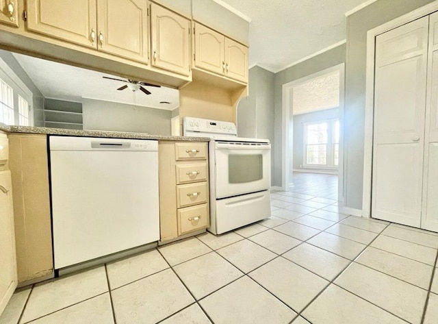 kitchen with crown molding, light tile patterned floors, white appliances, and ceiling fan