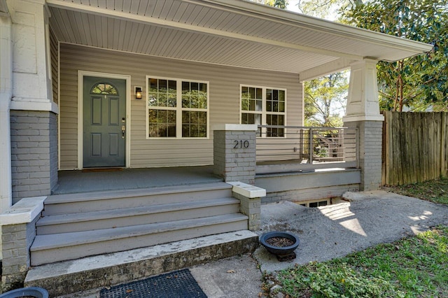 entrance to property with a porch