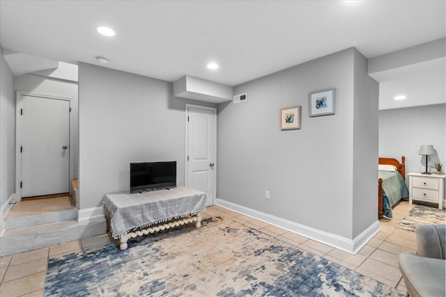 living area with light tile patterned floors