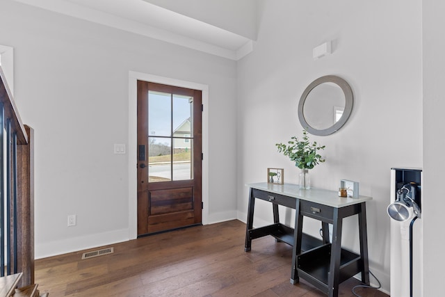 foyer with dark hardwood / wood-style flooring