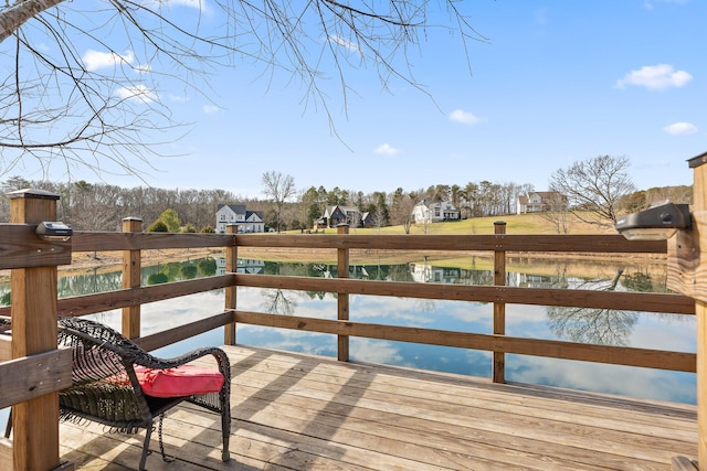 dock area with a deck with water view