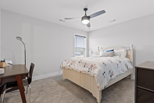 bedroom with light carpet and ceiling fan