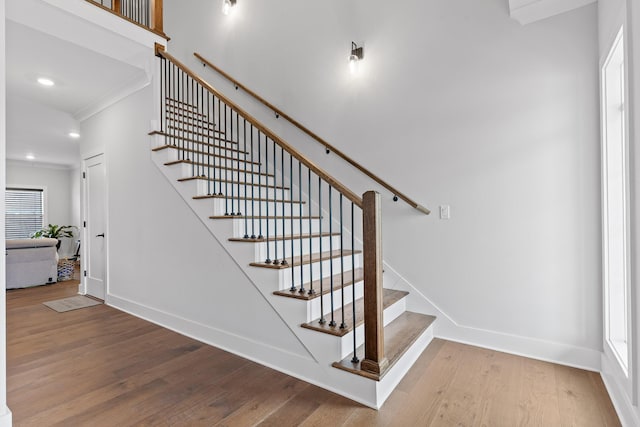 stairway featuring wood-type flooring