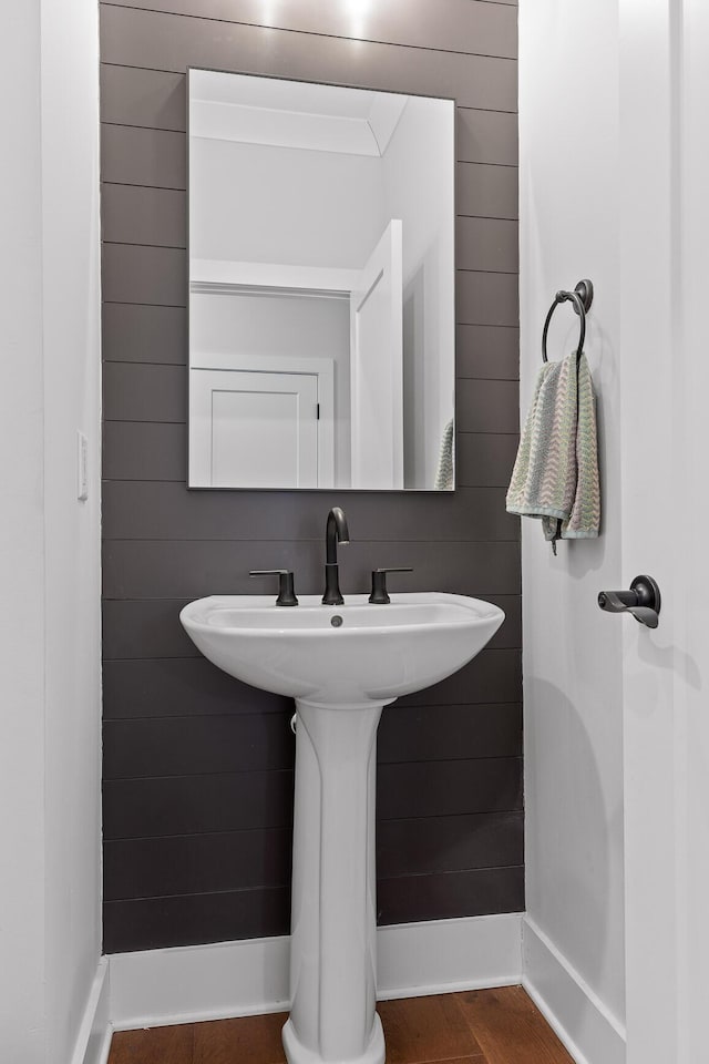 bathroom featuring sink and hardwood / wood-style flooring