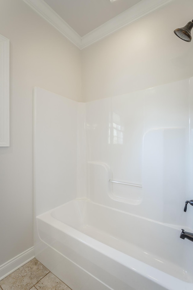 bathroom featuring ornamental molding, tile patterned floors, and shower / tub combination