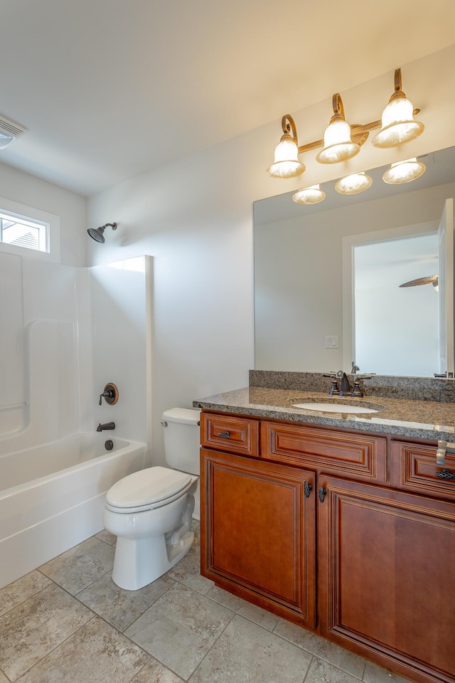 full bathroom with shower / washtub combination, toilet, and vanity