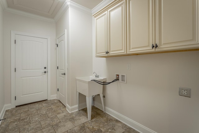 clothes washing area featuring cabinets, washer hookup, hookup for an electric dryer, and ornamental molding