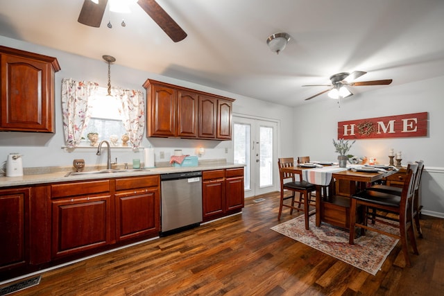 kitchen featuring sink, pendant lighting, dishwasher, ceiling fan, and dark wood-type flooring