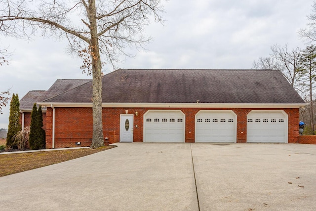 ranch-style home with a garage