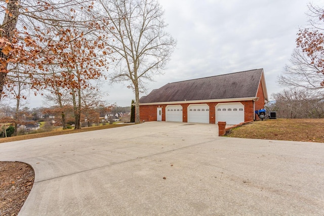 view of property exterior featuring a garage