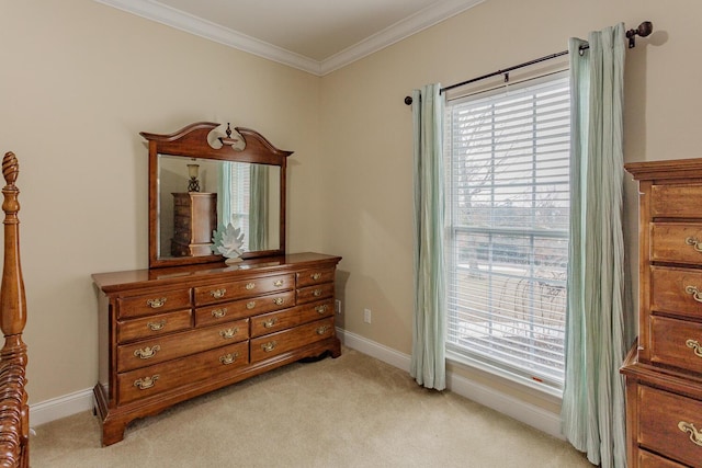 bedroom with crown molding and light carpet