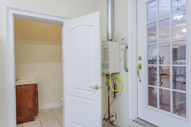 interior space with sink and water heater