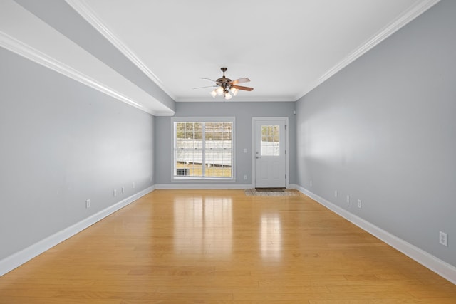 interior space featuring crown molding, ceiling fan, and light hardwood / wood-style flooring