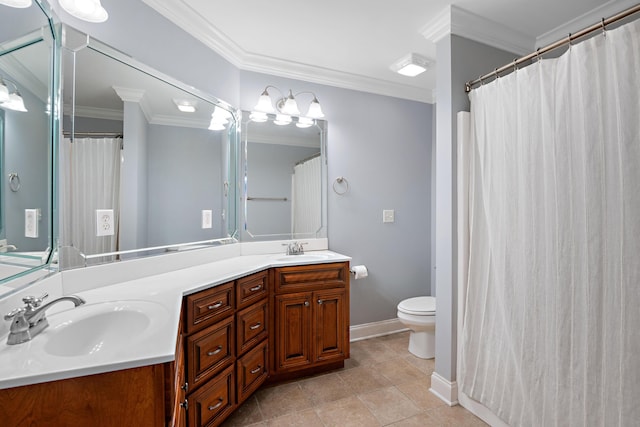 bathroom with vanity, crown molding, tile patterned floors, and toilet