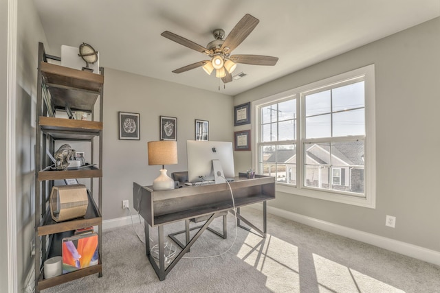 office area with light colored carpet and ceiling fan