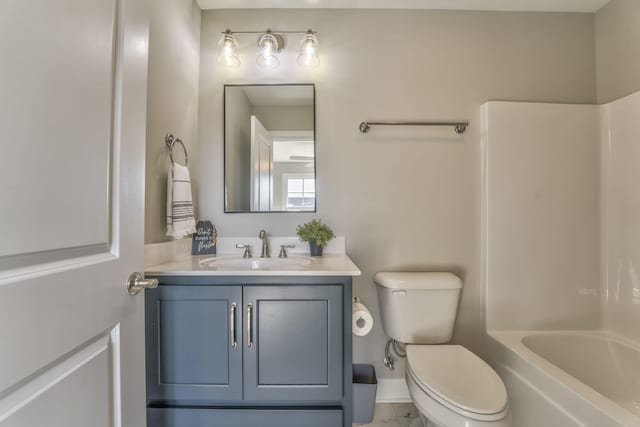 full bathroom featuring shower / bath combination, vanity, and toilet