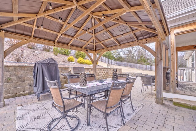 view of patio featuring area for grilling, a gazebo, and ceiling fan