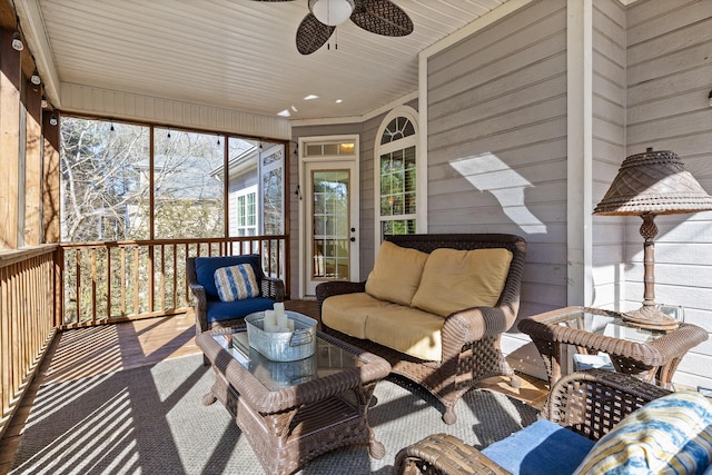 sunroom / solarium with ceiling fan