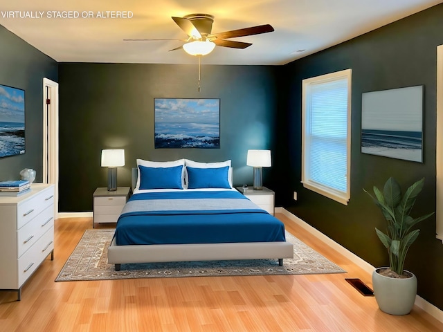 6445 Brookmead Cir, Hixson, TN 37343 - bedroom with wood finished floors and ceiling fan