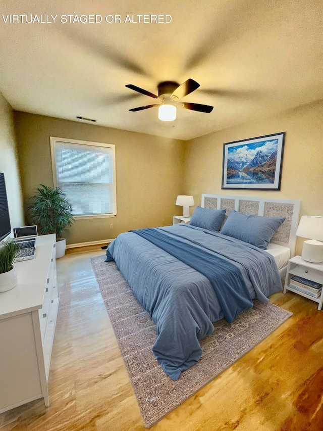 6445 Brookmead Cir, Hixson, TN 37343 - bedroom with light wood-style floors and a ceiling fan