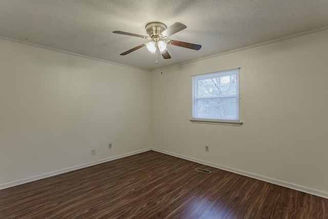 spare room with crown molding, dark hardwood / wood-style floors, ceiling fan, and a textured ceiling