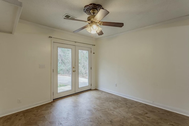 interior space featuring french doors, crown molding, and a textured ceiling