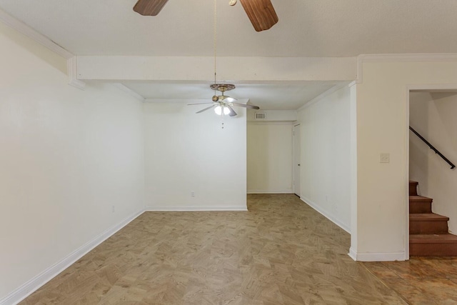 empty room featuring ornamental molding and ceiling fan