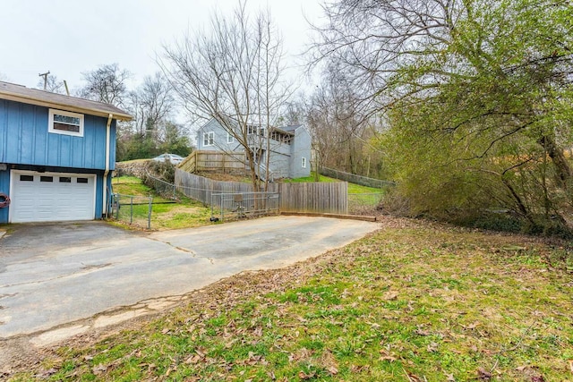 view of yard featuring a garage