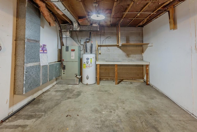 basement featuring heating unit and water heater