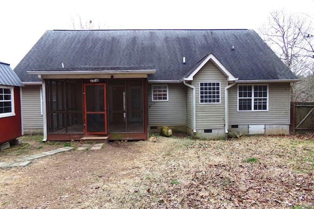 back of property featuring a sunroom