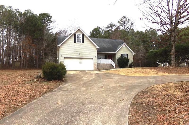 view of front of property with a garage