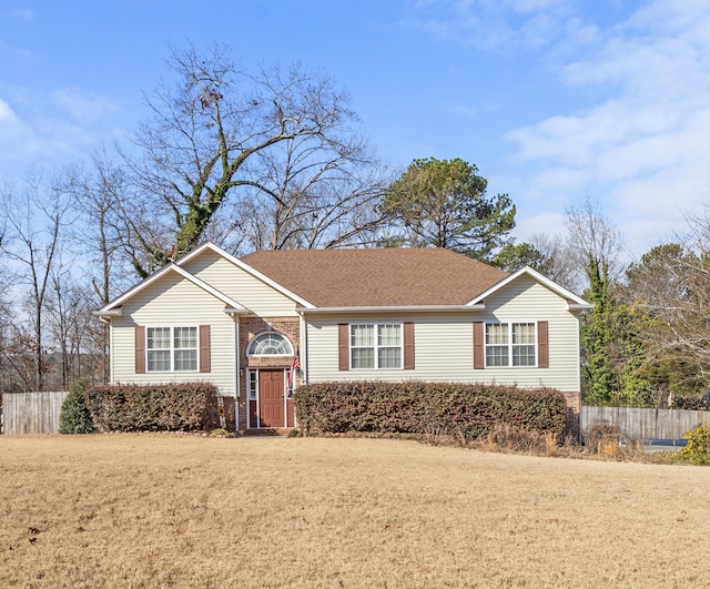 view of front of house with a front lawn