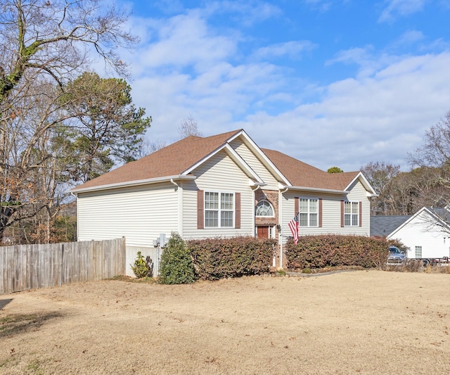 view of front of home with a front lawn