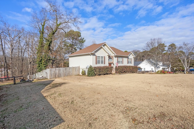 view of front of home with a front yard