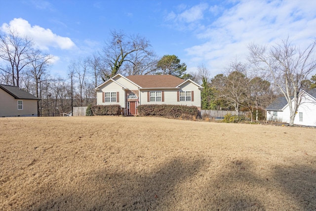 view of front of property with a front lawn